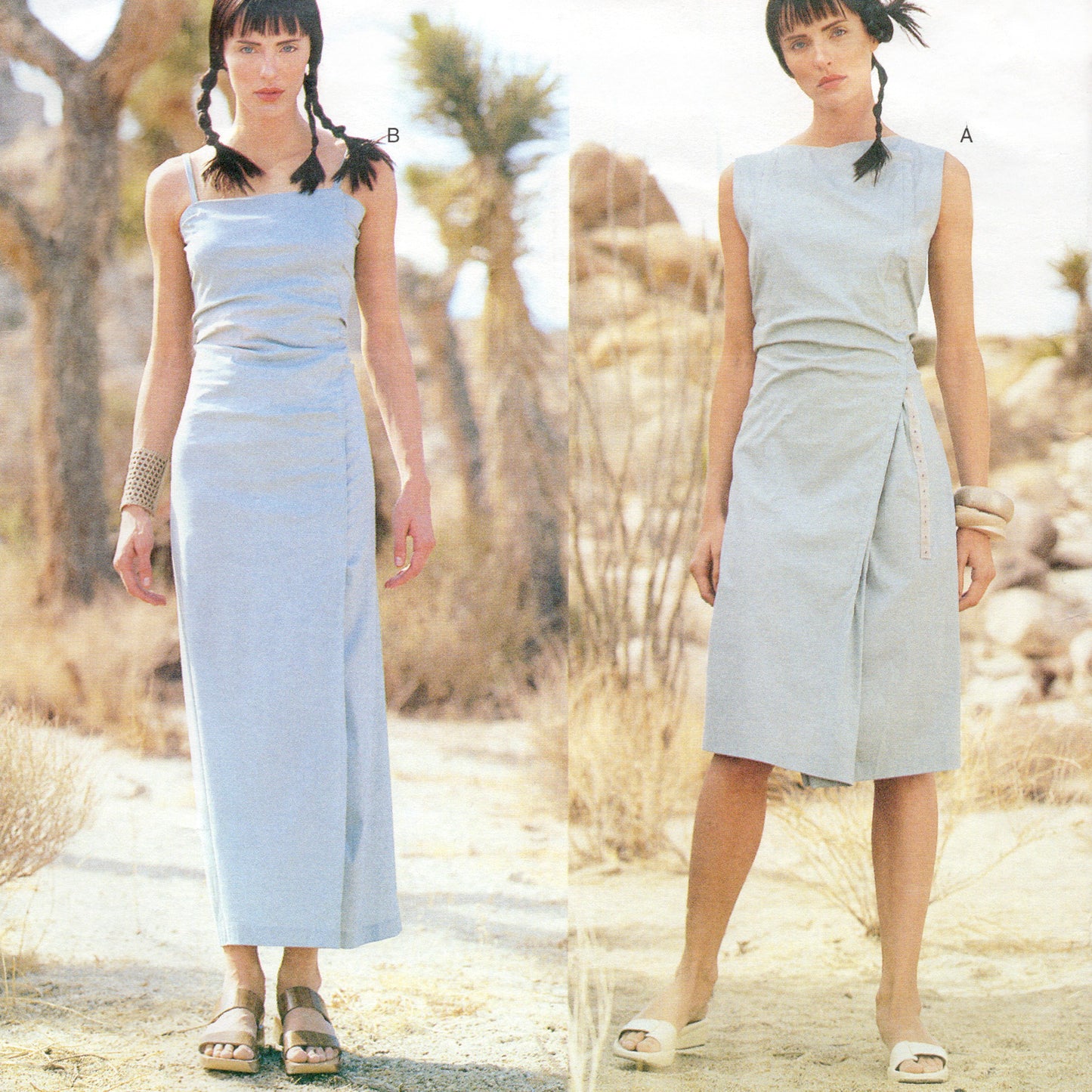 Woman wearing two different light blue dresses in a desert setting