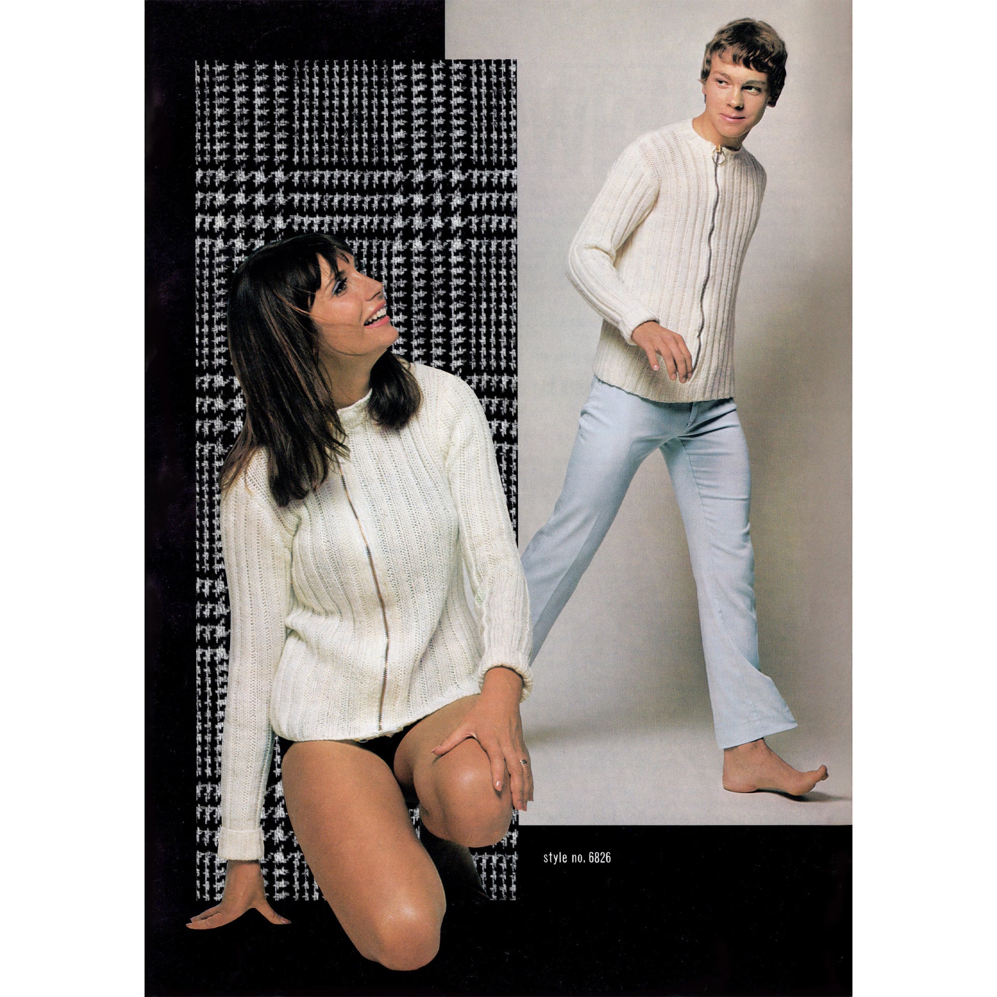 Two people wearing white knitted cardigans and light blue pants against a plain background.
